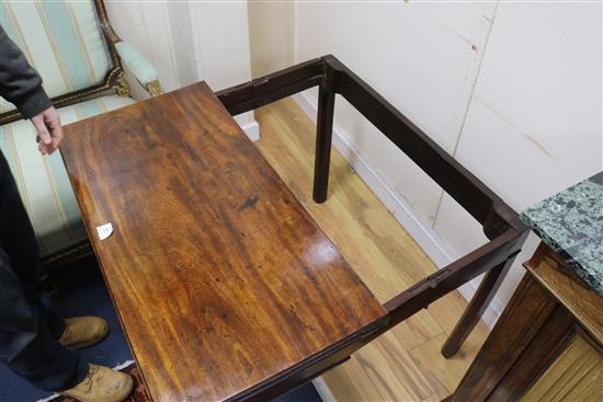 A Georgian mahogany card table with concertina action W.91cm